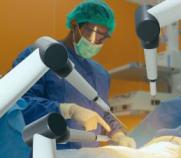 surgeons performing robotic surgery
