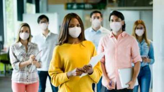 group of diverse students wearing masks