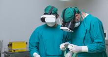 Two doctors using virtual reality for surgery