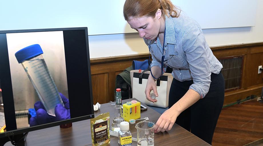 Kaitlyn Sadtler of NIBIB’s Intramural Research Program sets up a demonstration to showcase her lab’s research on immunoengineering.  The demonstration showed how engineered tissues imbedded in a gel can be protected from an immune response that tries to attack the tissue after it is transplanted.