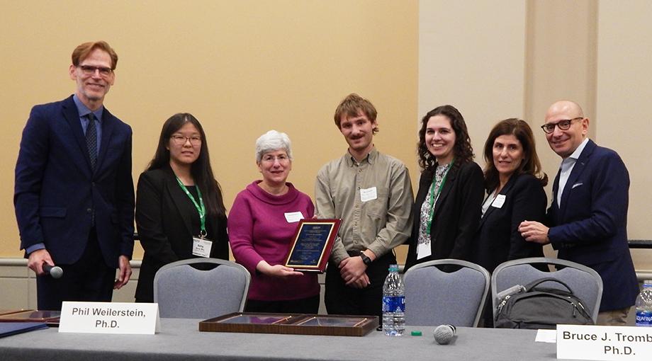 First-place prize was renamed this year to the Steven H. Krosnick prize and was awarded to the team from Columbia University for an intubation guidance system. Left to Right: Bruce Tromberg, Amy Wu, Lisa Krosnick, Matt Lavine, Miriam Saffern, Phyllis Lavine, Jeff Lavine.