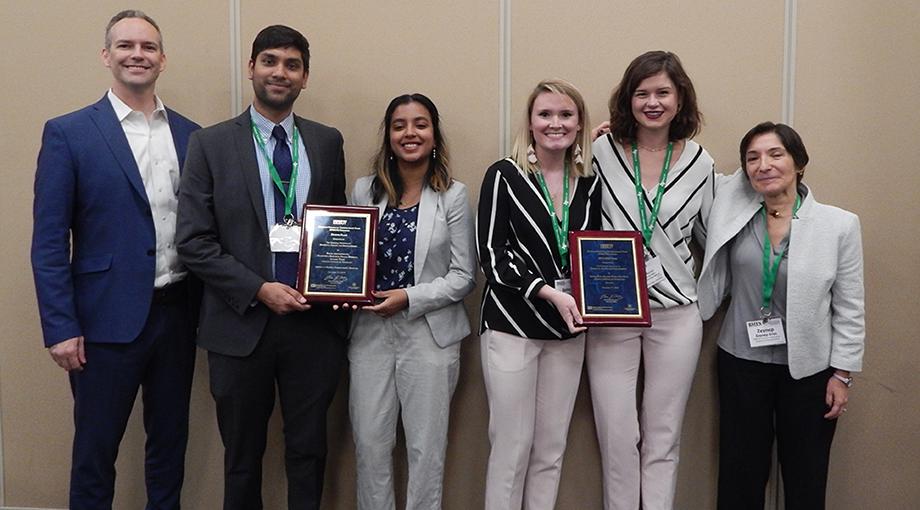 Georgia Tech students Bailey Klee and Rachel Mann (second and third from right), part of the team that won the HIV Prize are joined (L-R) by  James Rains, Pranav Dorbala, and Madhumita Baskaran (2nd place winners from Georgia Tech) and Zeynep Erim, Director, NIBIB Training Program (far right).