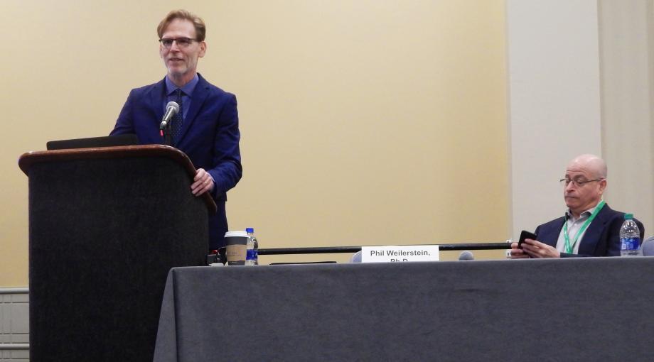 Bruce Tromberg (left), Director of NIBIB, and Phil Weilerstein of VentureWell present the 2019 DEBUT Challenge awards.