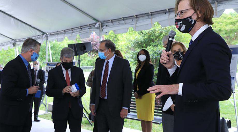 From left, Senators Roger Marshall (Kansas), Roy Blunt, (Missouri), and John Boozman (Arkansas) take a closer look at a component of the Mesa Biotech Accula System, a visually read test using RT-PCR technology to detect SARS-CoV-2 at the point of care that provides lab-quality results in about 30 minutes. (NIH photo by Chia-Chi Charlie Chang)