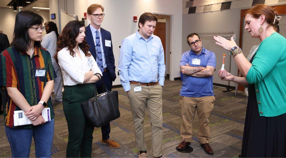 Julie Sullivan (far right) from the Center for Advancement of Diagnostics for a Just Society explains how rapid antigen tests for COVID-19 were independently validated before seeking authorization from the U.S. Food and Drug Administration (FDA).