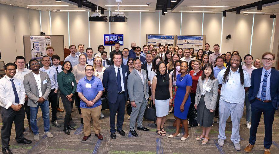 A group photo from the event, including congressional staff, AIMBE leadership, NIBIB-supported demonstrators, and NIBIB staff.